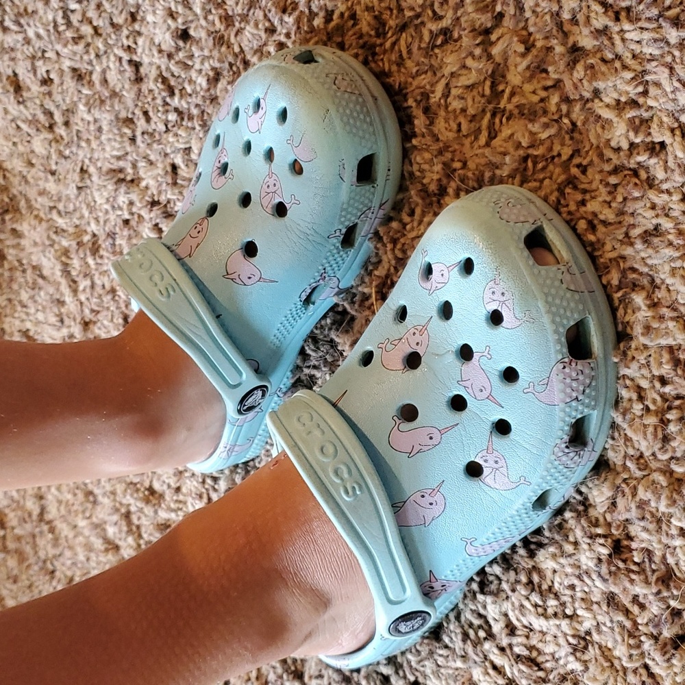 Child size 12, Crocs with narwhals.